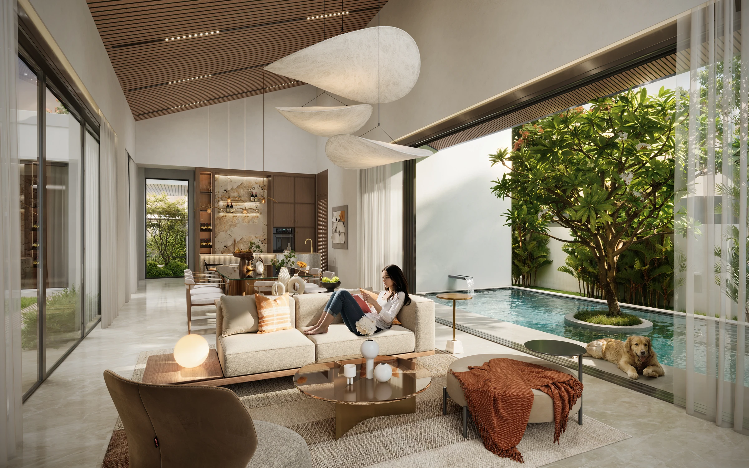 A Silver Ranches villa living room opening onto its courtyard pool